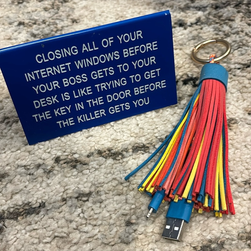 Funny sign and iPhone charger